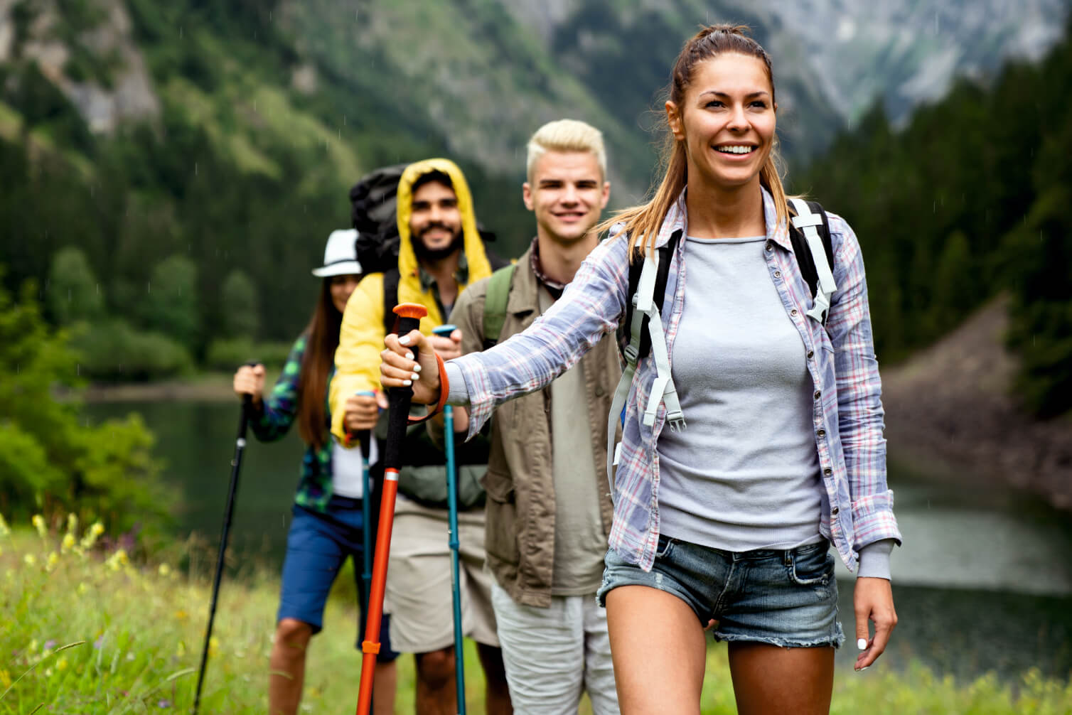 group-of-smiling-friends-hiking-with-backpacks-out-2022-01-18-23-40-11-utc