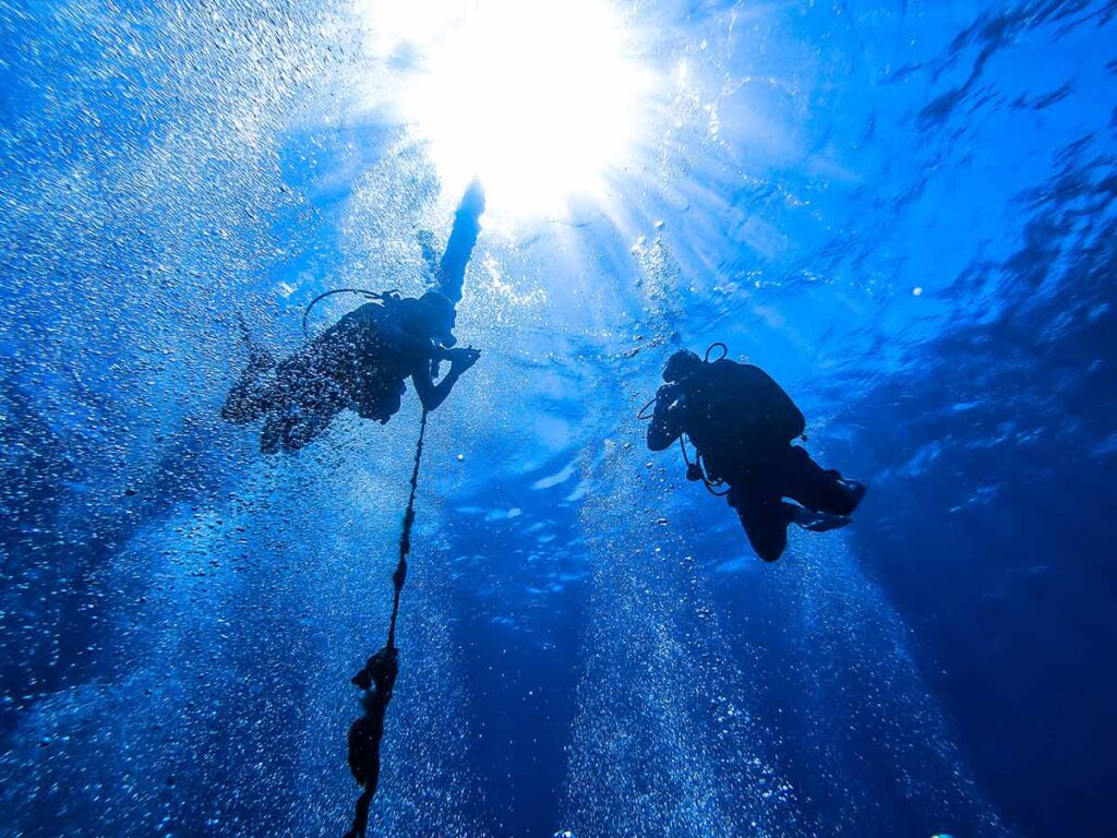 <strong>Crete temperature by month: What to expect all year round</strong> 5 Aerial view of the Chania lighthouse and Venetian harbor in Crete, Greece, with turquoise sea and city backdrop.